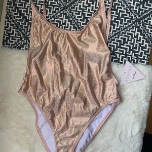 Beautiful rose gold one piece bathing suit NWT